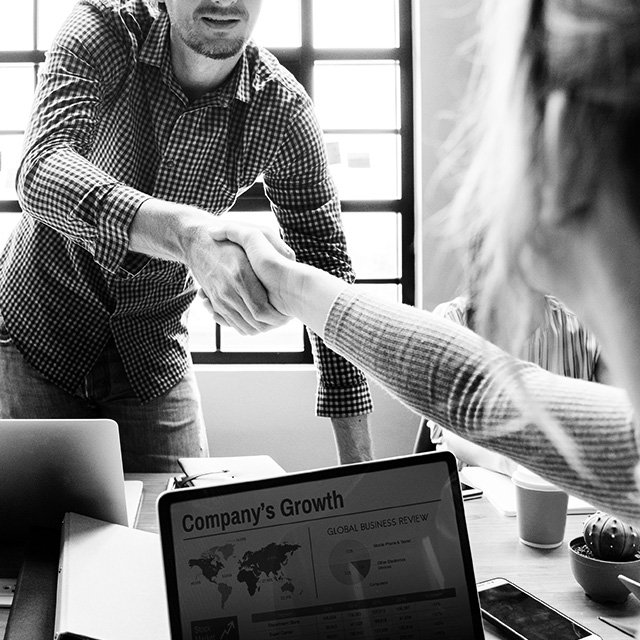 Two people shaking hands