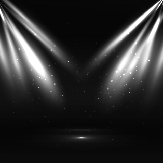 Two spot lights on a black background