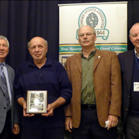 (L-R): Kitchener Mayor Carl Zehr, Kurt Munz (recipient of the KSA Volunteer Recognition Award for Stanley Park Optimist Ball), Gord Dearborn (presenter) and Bill Pegg (President, KSA) (11/18/14)